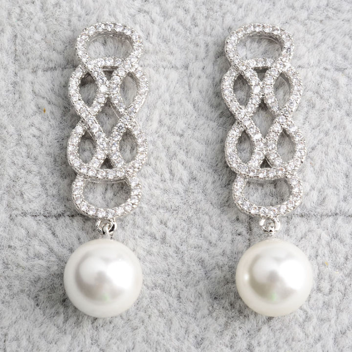 white-teardrop-sea-shell-pearl-white-golden-plated-cz-pave-earrings