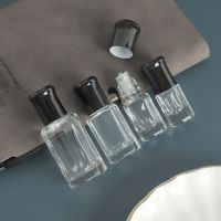 Wholesale Portable Perfume Bottle with Stainless Steel Roller Ball Glass Dropper Stick 3ml 6ml 12ml Essential Oil Bottle