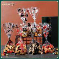 SHUKEYI 50pcs หลอกหรือปฏิบัติ ถุงขนมฮาโลวีน กระเป๋าใส่ขนม กระดาษแก้วโปร่งใส แพ็คถุงของขวัญ น่ารักน่ารักๆ แพ็คอาหารพลาสติก ถุงของขวัญ ตกแต่งฮาโลวีน