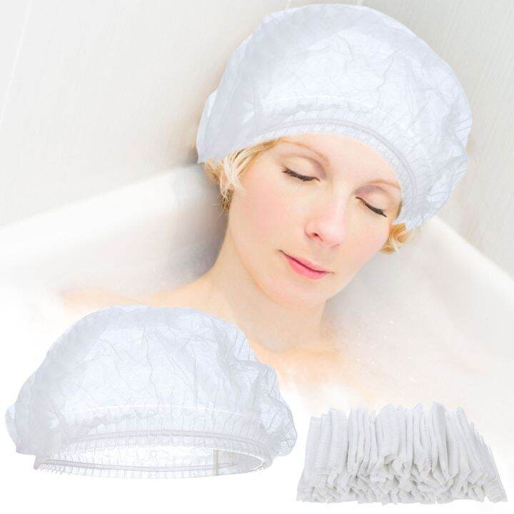 100-pcs-disposable-shower-cap-plastic-waterproof-headgear-hotel-hair-shower-cap-transparent-plastic-beauty-salon-cap-cling-showerheads