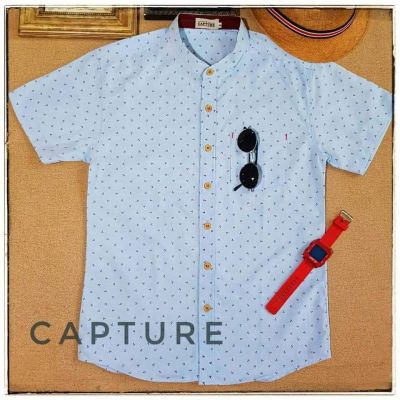 Capture Shirt เสื้อเชิ้ตผู้ชาย คอจีน แขนสั้น oxford ลายสมอ สีฟ้าอ่อน มีถึงอก 48 นื่ว