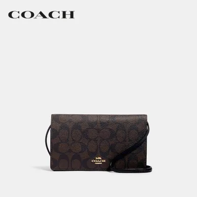 COACH กระเป๋าถือผู้หญิงรุ่น Anna Foldover Crossbody Clutch In Signature Canvas สีน้ำตาล 3036  IMAA8