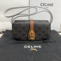 CELINE CLUTCH ON STRAP TABOU IN TRIOMPHE CANVAS AND CALFSKINTAN