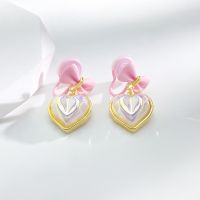 [COD] and lovely bowknot love Ji pearl mosquito coil ear clip pink girl heart summer net red earrings