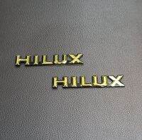 1คู่ HILUX  โลโก้ไฮลักษ ติดข้างแก้ม  สีทอง-ดำ โตโยต้า HILUX MIGHTY-X LN 85-111 SR-5 1989-1998