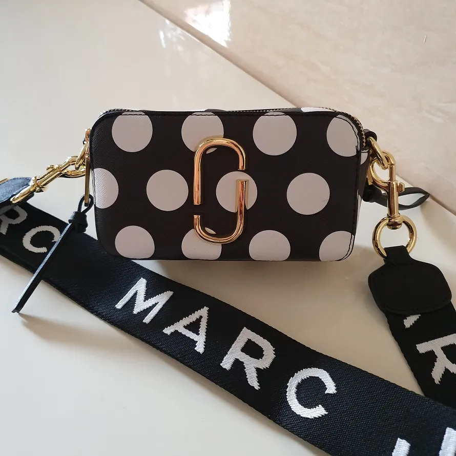 Guaranteed Authentic Polka Dots Print Medium Snapshot Camera Bag with MJ  Strap-Black / White