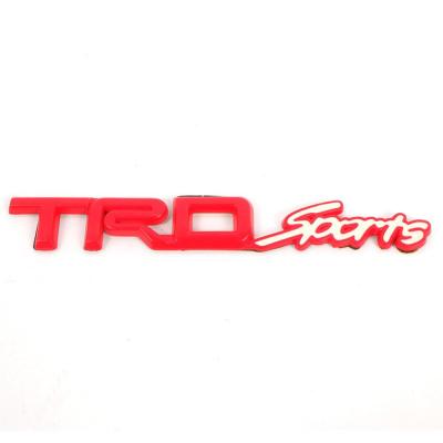 โลโก้ตัวอักษร TRD Sports สีแดง-ขาว ติดรถ สำหรับรถ Toyota Hilux Revo จำนวน 1 ชุด