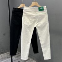 ♂ High-end casual nine-point white trousers mens trendy youth simple jeans Korean version of slim feet elastic trousers