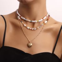 [COD] European and cross-border multi-layer rice beads LOVE letter peach heart pendant necklace female niche creative