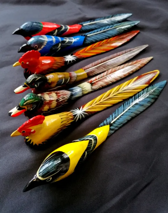 OPEN YOUR BILLS AND LETTERS IN STYLE WITH THIS LETTER OPENER IN COLORFUL BIRD DESIGN. ALSO AN