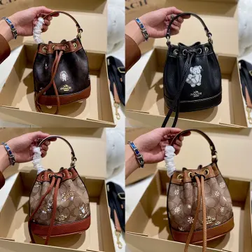 Louis Vuitton Monogram Mini Lin Noelie Bucket Bag - Neutrals