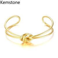 Kemstone สแตนเลสสตีลแบบสร้างสรรค์ Cuffs ชุบทอง Knot เปิดสร้อยข้อมือผู้หญิง