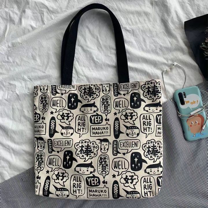 homemart-shop-กระเป๋าผ้าลายการ์ตูนอักษร-แนววิเทจ-กระเป๋าถือ-กระเป๋าผู้ชายผู้หญิง-bag017