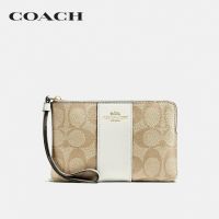 COACH กระเป๋าคล้องมือขนาดเล็กผู้หญิงรุ่น Corner Zip Wristlet In Signature Canvas สีครีม 58035 IMDQC