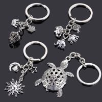 【DT】Keychain For Man Women Original Gift Friend Dragon Dog Cat Jewelry Love Heart Car Key Chain Gun Evil Eye Bag Pendant Wholesale hot