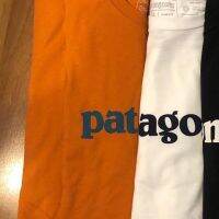 จุด Patagonia Joker ง่ายพิมพ์จดหมายหลวมชายและหญิงคู่สั้นเสื้อยืด