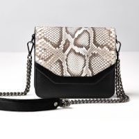 ￼Xotique  Crossbody Bag Black Natural Back with removable strap