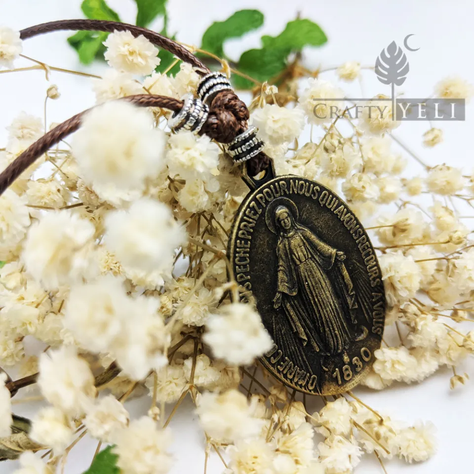 Meaning of virgin hot sale mary pendant