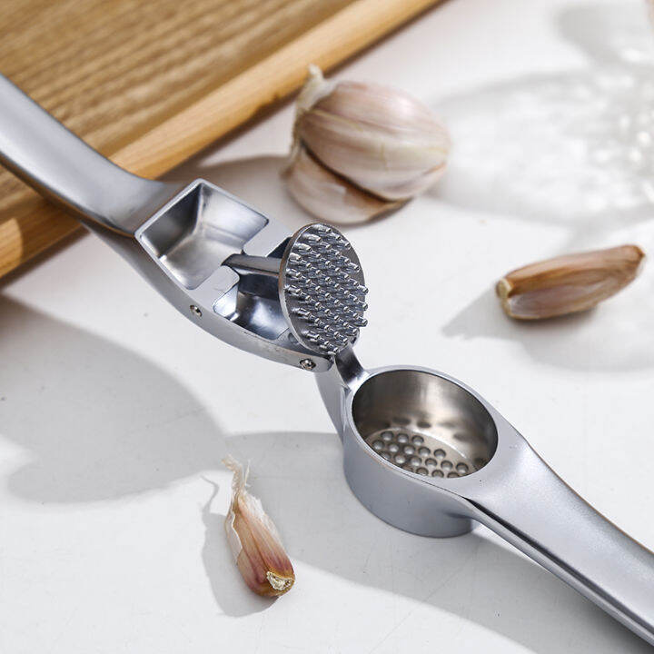 professional-garlic-press-heavy-soft-handled-zinc-alloy-garlic-mincer-and-crusher-เครื่องมือห้องครัว