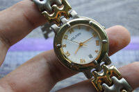 นาฬิกา Vintage มือสองญี่ปุ่น HILTON ระบบ QUARTZ ผู้หญิง ทรงกลม กรอบทอง หน้าปัดตัวเลขโรมัน หน้าปัด 33มม. สายสแตนเลสแท้ ใช้งานได้ปกติ สภาพดี ของแท้ ไม่กันน้ำ