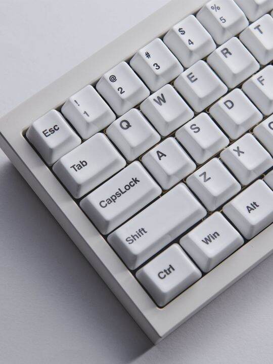 Ceramic keycaps with smooth glazed surface and uniform translucency ...