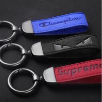 พวงกุญแจรถยนต์แฟชั่นบุคลิกภาพจี้โลหะที่สำคัญSupreme Keychain