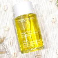 Clarins Tonic Body Treatment Oil #100ml เน้นลดการแตกลายของผิว เพิ่มความยืดหยุ่นของผิว ผิวนุ่มละมุนดุจซาตินน่าสัมผัส