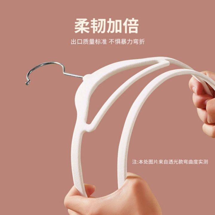 cod-new-light-transmitting-flocking-hangers-for-drying-clothes-manufacturers-thickened-adult-hanging-organizer-storage-cross-border-e-commerce-factory