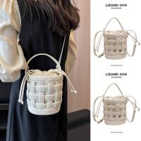 Summer white crossbody bag female 2023 new portable niche design all-match drawstring hollow woven bucket bag 【BYUE】