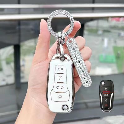 กระเป๋ากุญแจของรถใบมีดที่ติดตั้งด้านหลังจะถูกติดตั้งไปที่โตโยต้า Zhixuan X Weichi Fs โคโรลล่าแคมรี Ruizhi หัวเข็มขัดเคสใส่รีโมตคอนโทรล
