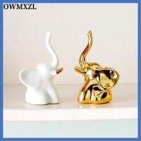 OWMXZL 1/2pcs ทอง/ขาว รูปปั้นช้างรูป ของตกแต่งบ้าน เซรามิกส์ เครื่องประดับที่เรียบง่าย น่ารักมากๆ รูปแกะสลักช้างสไตล์โมเดิร์น ห้องนั่งเล่นในห้องนั่งเล่น