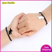 JIYAN2866 2 Pair อีลาสติก กำไลข้อมือคู่ น่าสนใจร่วมกัน แม่เหล็กแบบแม่เหล็ก กำไลเชือกมิตรภาพ แฟชั่นสำหรับผู้หญิง ปรับได้ปรับได้ สร้อยข้อมือจี้ไดโนเสาร์ คู่คู่กัน