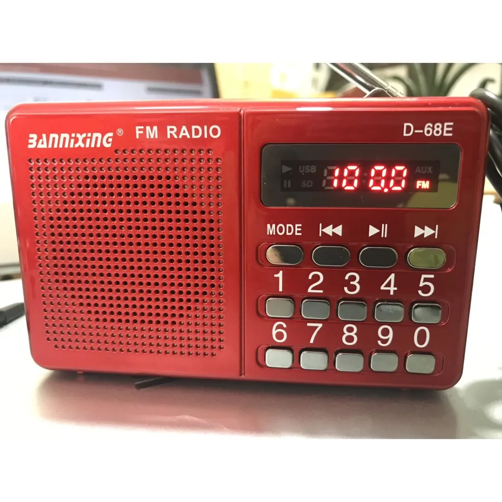 Đài FM Radio Bannixing D-68E kiêm máy nghe nhạc có cổng cắm USB và thẻ nhớ,  tặng kèm pin 5C cùng dây sạc 