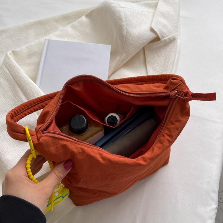 กระเป๋าเดินทางผู้หญิงน้ำหนักเบาปิดถุงซิปรักแร้ลำลองสำหรับวันหยุดสุดสัปดาห์ทุกวัน