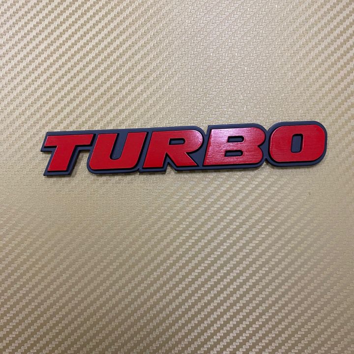 โลโก้* TURBO  สีแดงขอบดำ งานอลูมิเนียม ขนาด* 2.5 x 16 cm ราคาต่อชิ้น