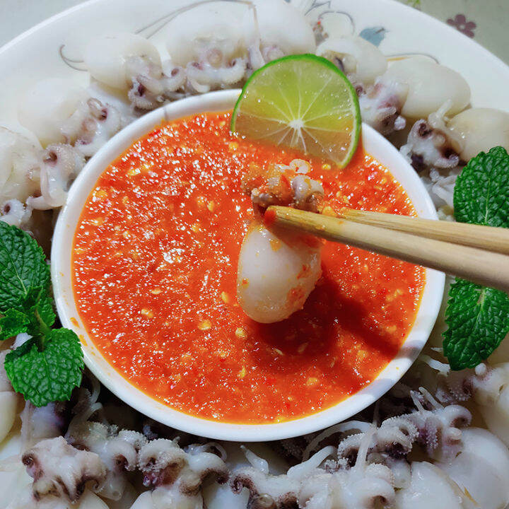 Thai seafood sauce green lemon pepper dipped in water Thai hot and sour