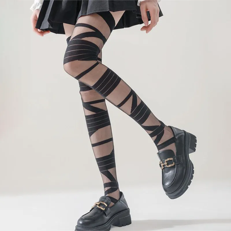 Is That The New Goth 1pair Ripped Tights & 1pair Fishnet Tights ??