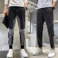 Winter han edition stitching jeans mens fashion elastic handsome nine minutes of pants popular logo leisure harlan beam foot trousers