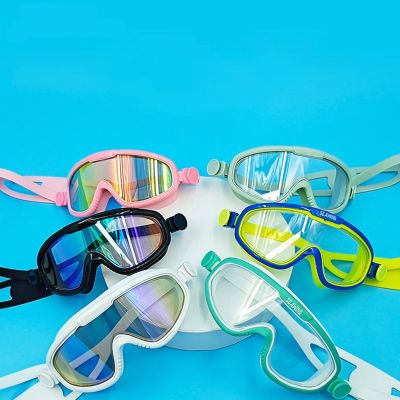 แว่นตาว่ายน้ำกรอบใหญ่สำหรับเด็กกันน้ำกันฝ้าแบนแว่นตาสีสันสดใสว่ายน้ำเด็กผู้หญิง