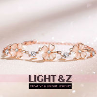 LIGHT &amp; Z Ins สไตล์สร้อยข้อมือหญิงสี่ใบโคลเวอร์พีชละอองเกสรคริสตัลเครื่องประดับอัญมณี