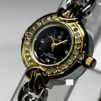 นาฬิกาข้อมือผู้หญิง GP รุ่น GP3811AG04 ตัวเรือนและสายนาฬิกาสีทองสลับสีเงิน ( 2กษัตรย์ ) หน้าปัดสีดำ ของแท้ 100 %