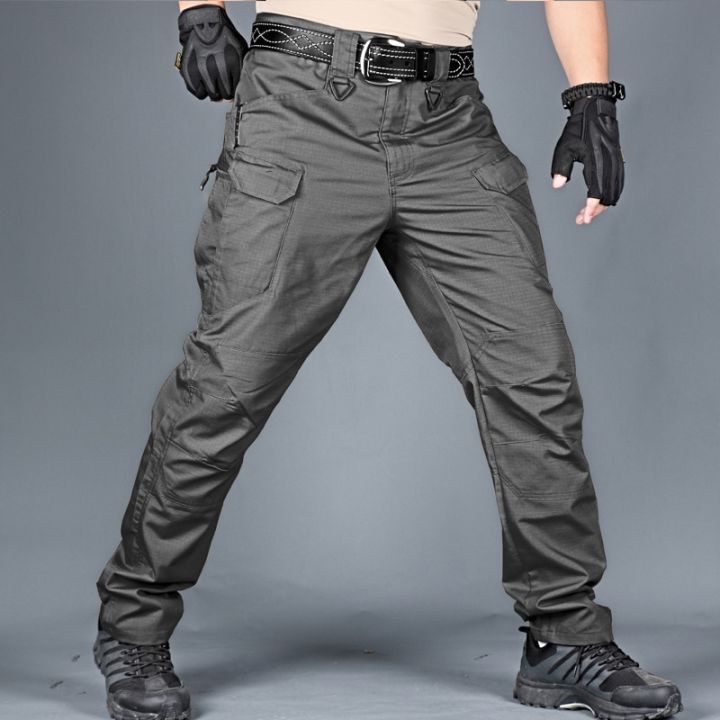 กางเกงทหารสำหรับเดินทางสำหรับบุรุษแบบใหม่ทหารยืดหยุ่นมีกระเป๋าหลายกระเป๋ากางเกงทหารสำหรับ6xl
