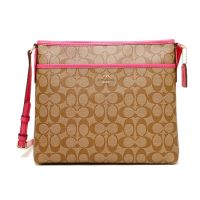 กระเป๋าสะพาย Coach แท้ Coated canvas ลาย Signature สายหนังแท้ ปรับความยาวสายได้ ช่องเยอะ COACH 34938 SIGNATURE COATED CANVAS FILE BAG CROSSBODY BAG  Dahlia