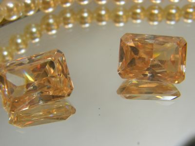 แชมเปญ เพชรรัสเซีย CZ (12X16 MM) มิล  46 carats 2 Pcs( 2 เม็ด)STEP CUT CHAMPANGE Cubic zirconia American diamond stone