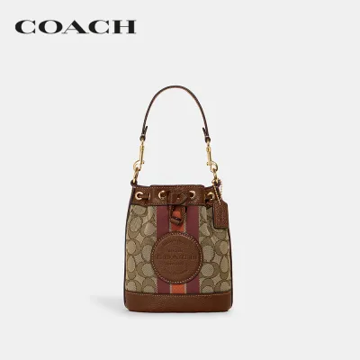 COACH กระเป๋าสะพายข้างผู้หญิงรุ่น Mini Dempsey Bucket Bag In Signature Jacquard With Stripe And Coach Patch สีน้ำตาล C8322 IMVGB