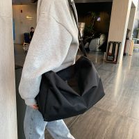 [COD] bag outdoor Dongnuo solid simple men and women large capacity single shoulder casual light diagonal