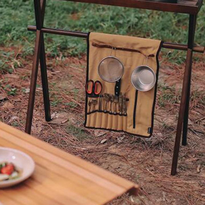 อุปกรณ์สำหรับตั้งแคมป์ม้วนขึ้นที่จัดระเบียบถุงบนโต๊ะอาหารที่เก็บตัวแขวนแบบม้วนการทำอาหาร