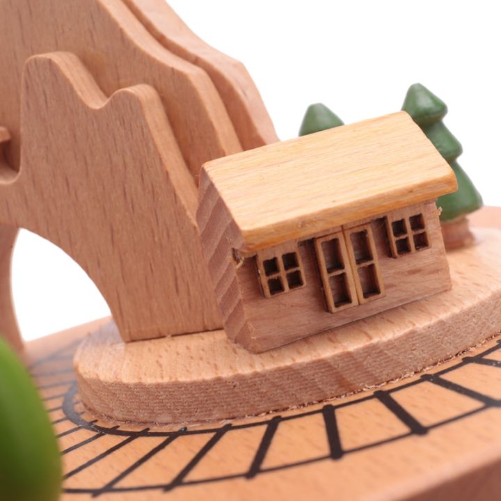 wooden-musical-box-featuring-mountain-tunnel-with-small-moving-magnetic-train-plays