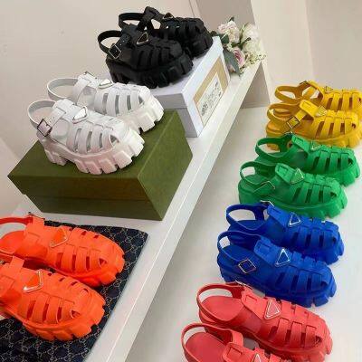 Bottom of the thick with baotou pure color wheel hole hole shoes women in the summer of the new foreign trade large size woven Roman sandals