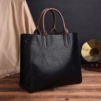 Hot selling Brand Monopoly Leather Womens New Atmospheric Handbag Business Large Capacity
